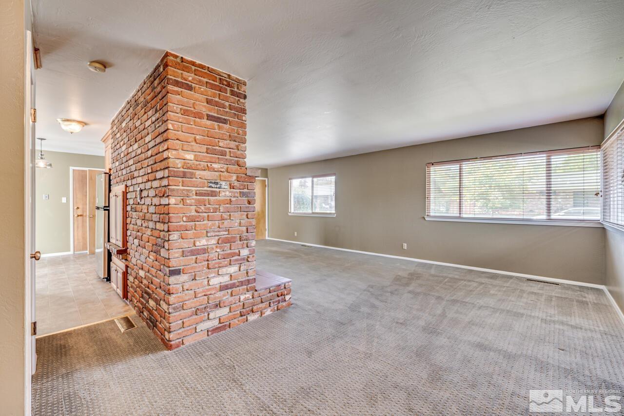 1950 Wren Street Reno, NV 89509 - Photo 2 of 24 a view of an empty room with windows