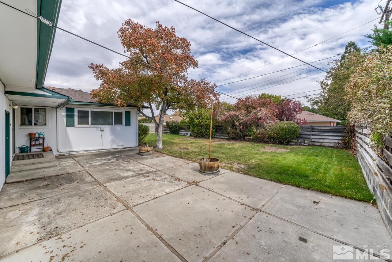 1950 Wren Street Reno, NV 89509 - Photo 23 of 24 a view of a house with backyard and a tree