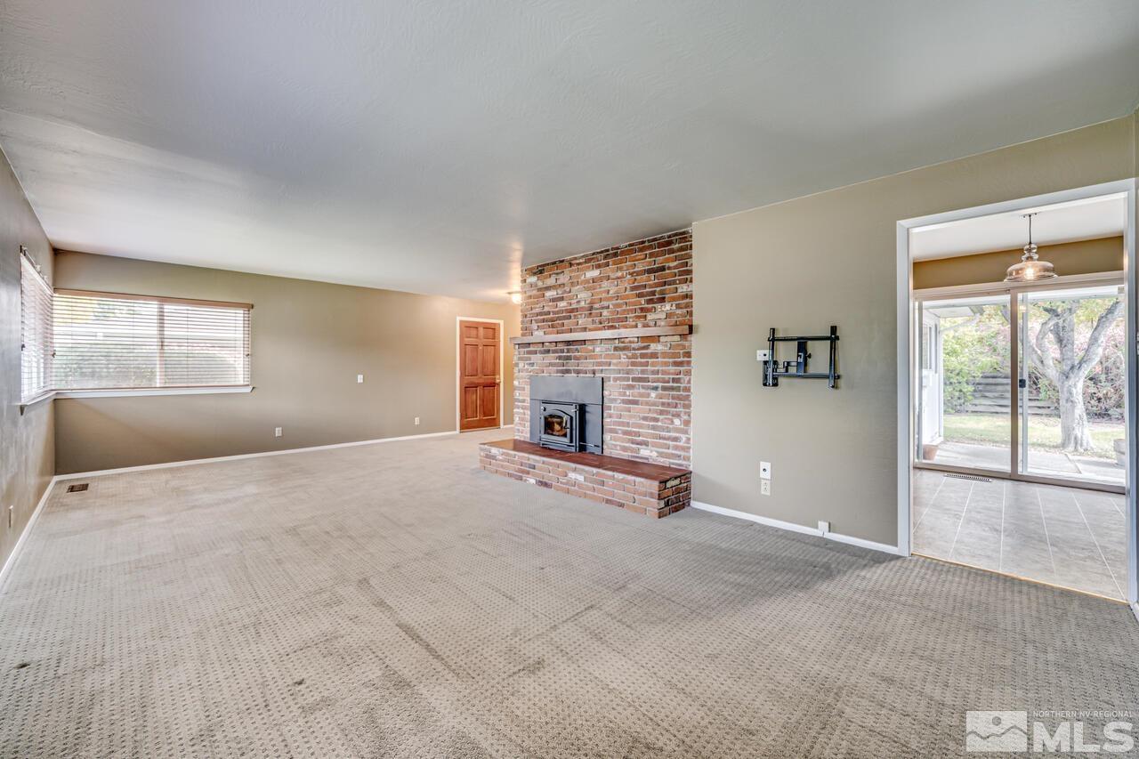 1950 Wren Street Reno, NV 89509 - Photo 4 of 24 a view of an empty room with a window