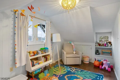 a bathroom with a sink a mirror and vanity