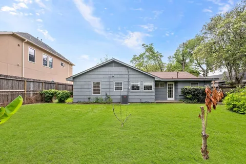 a house view with a garden space