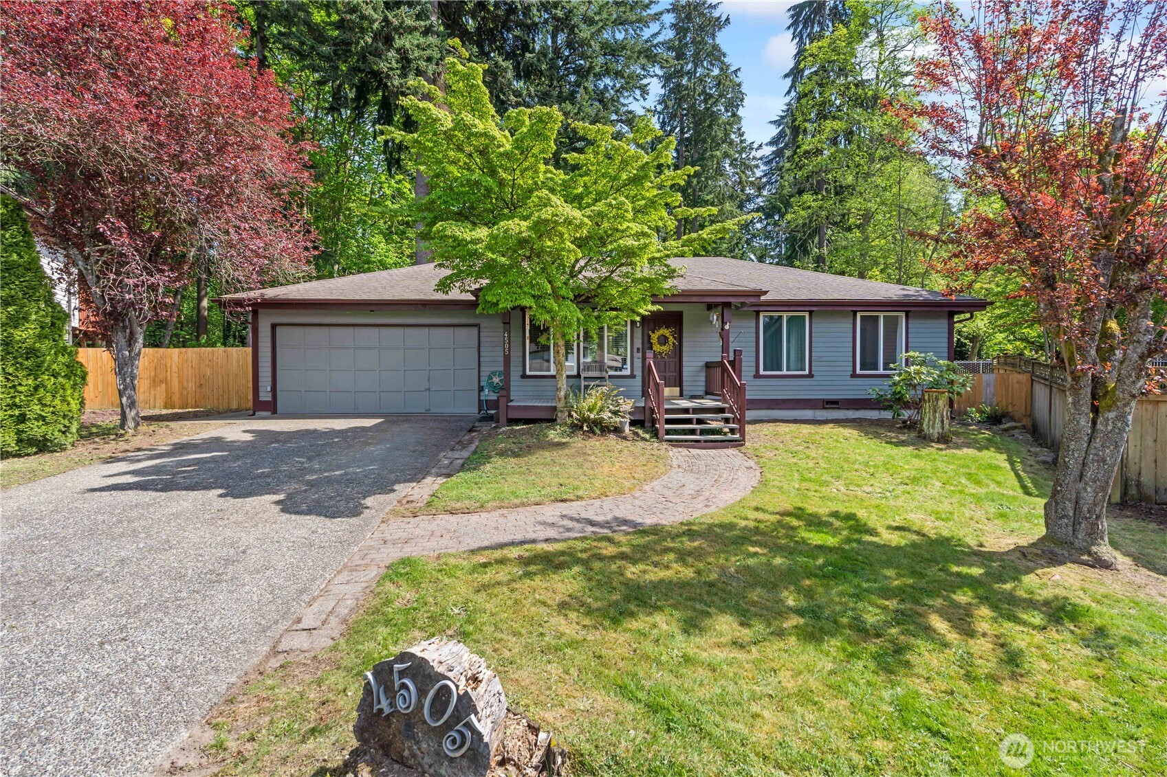4505 Southwest 317th Place Federal Way, WA 98023 - Photo 1 of 31 a house view with a sitting space and garden
