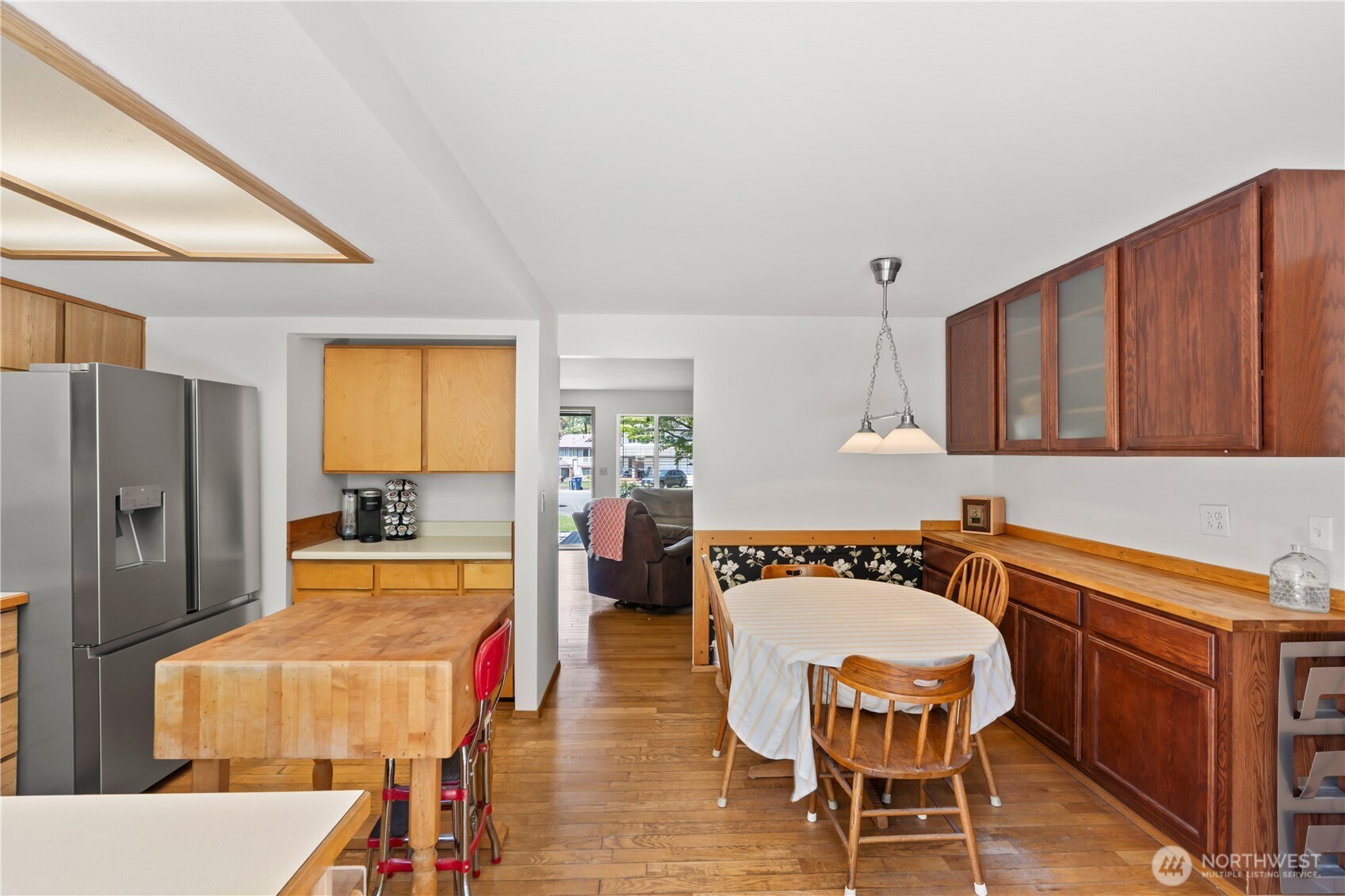 4505 Southwest 317th Place Federal Way, WA 98023 - Photo 13 of 31 a view of a kitchen with a dining table and chairs