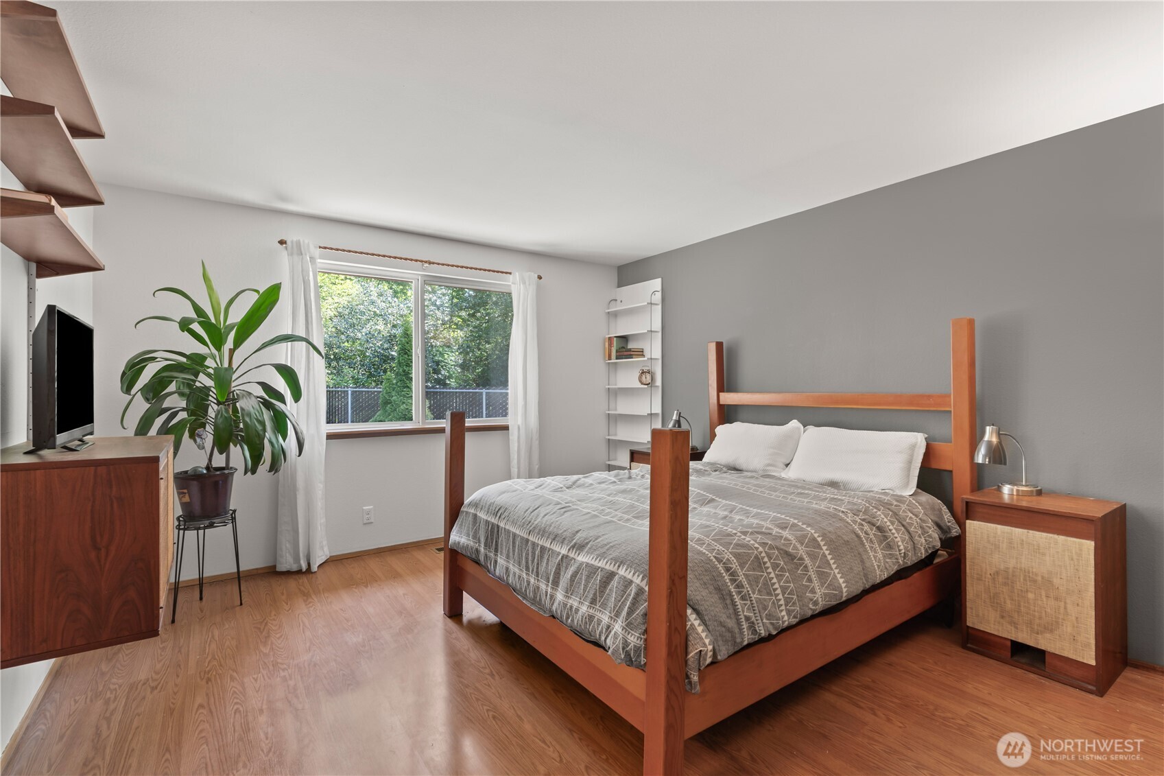 4505 Southwest 317th Place Federal Way, WA 98023 - Photo 20 of 31 a bedroom with a bed and a potted plant