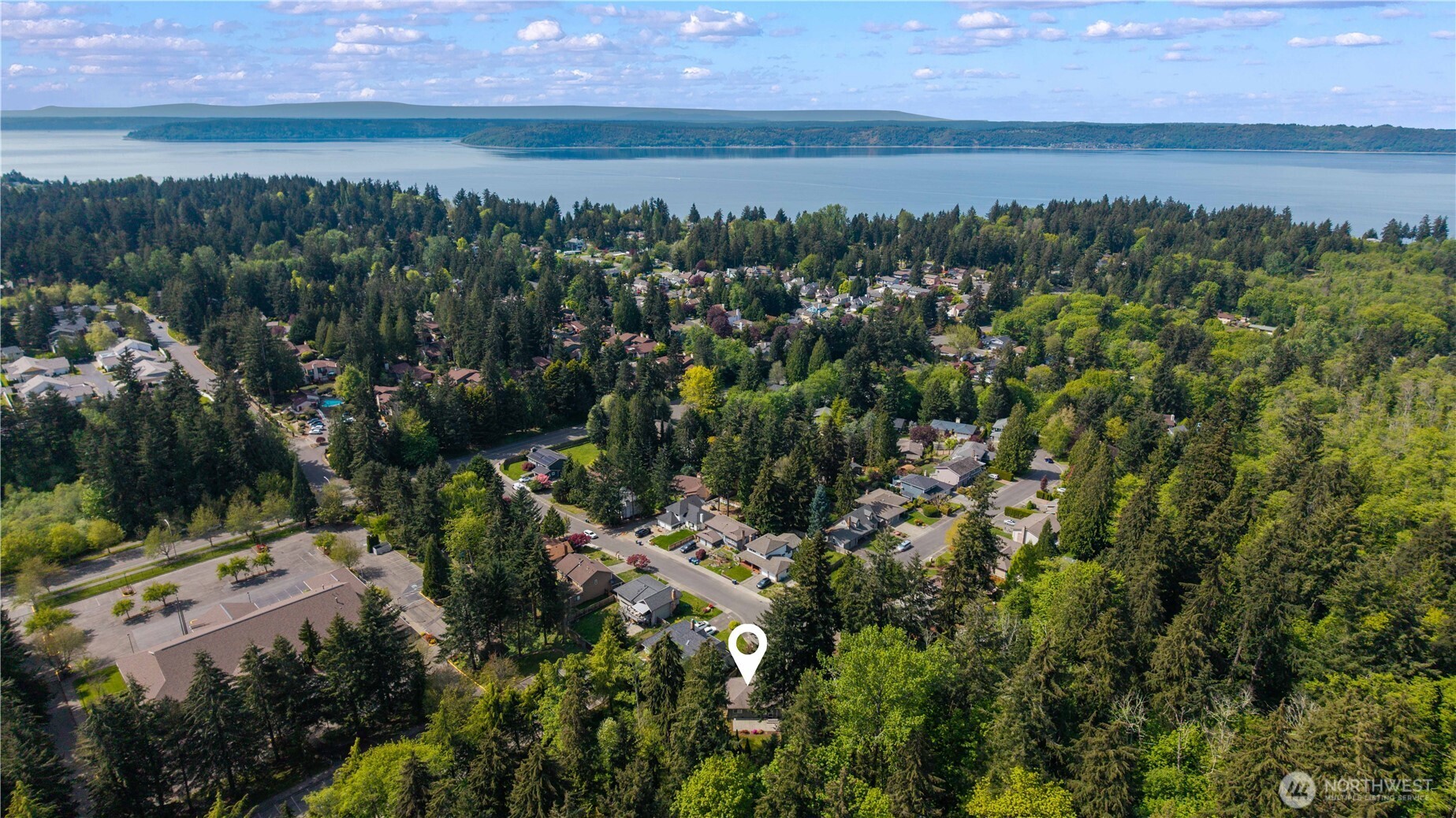 4505 Southwest 317th Place Federal Way, WA 98023 - Photo 2 of 31 a view of a lake from a yard