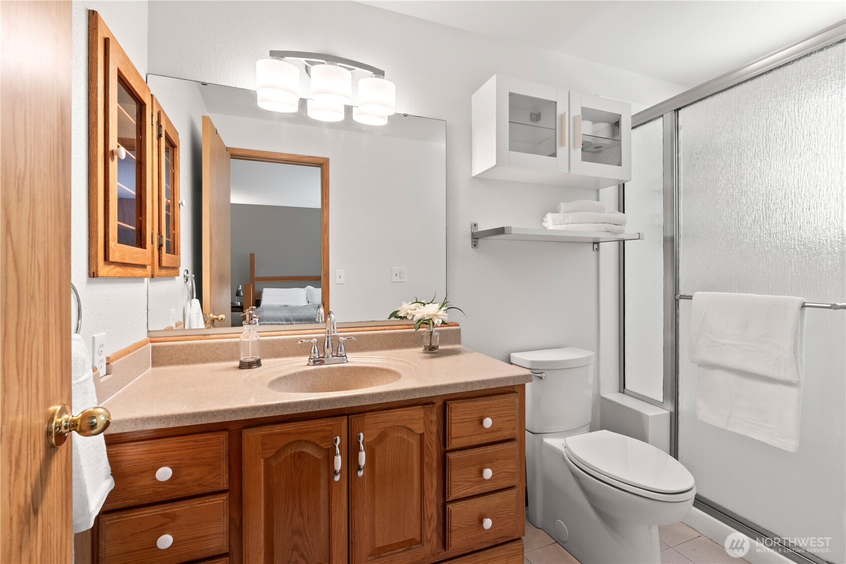 4505 Southwest 317th Place Federal Way, WA 98023 - Photo 21 of 31 a bathroom with a sink vanity mirror and toilet