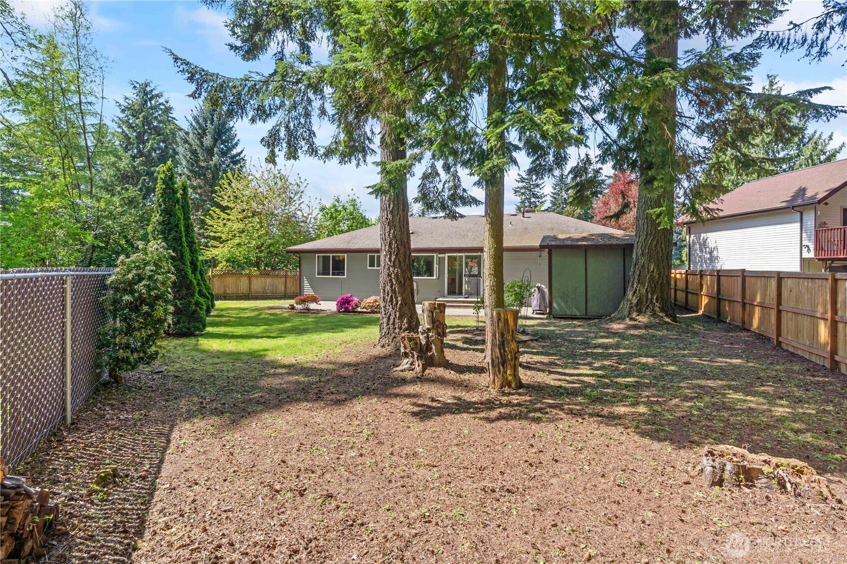 4505 Southwest 317th Place Federal Way, WA 98023 - Photo 25 of 31 a view of a house with a yard