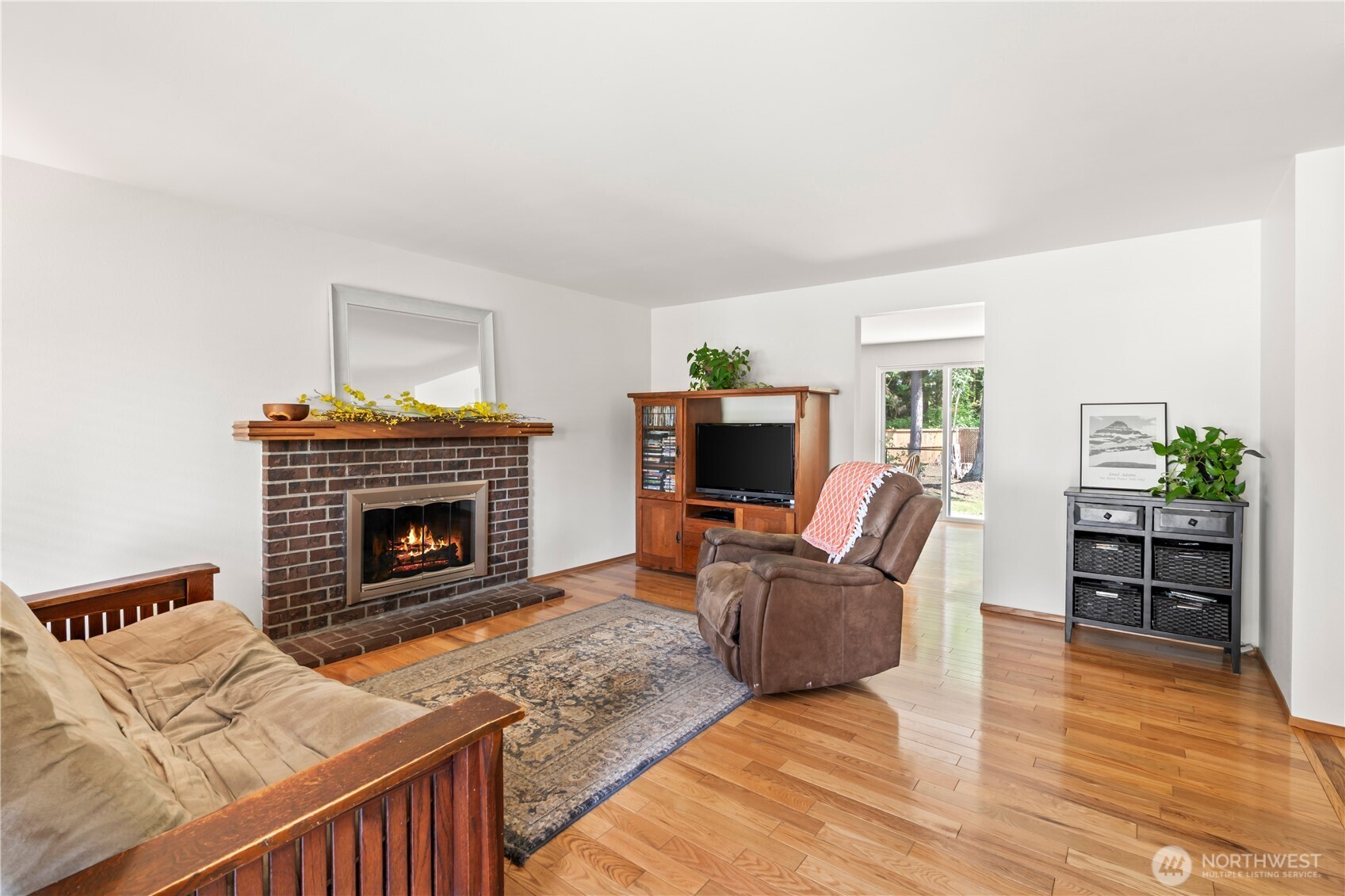 4505 Southwest 317th Place Federal Way, WA 98023 - Photo 9 of 31 a living room with furniture and a fireplace