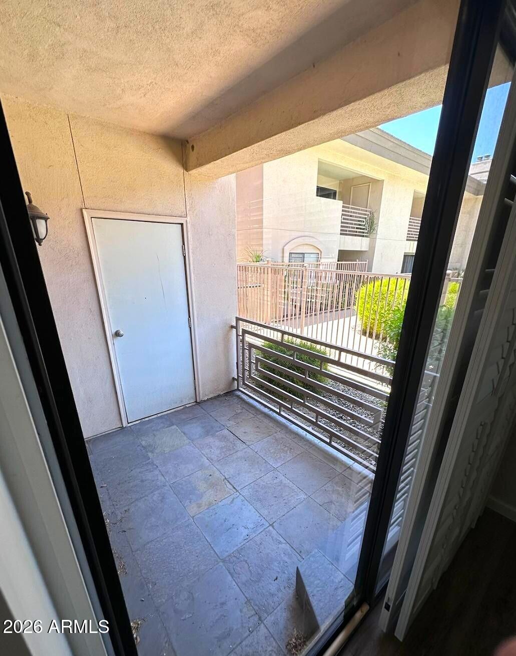 3235 East Camelback Road, Unit 114 Phoenix, AZ 85018 - Photo 10 of 12 COVERED PATIO
