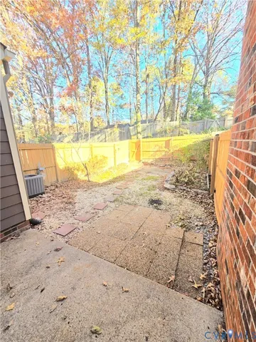a view of an swimming pool with an outdoor space and seating area