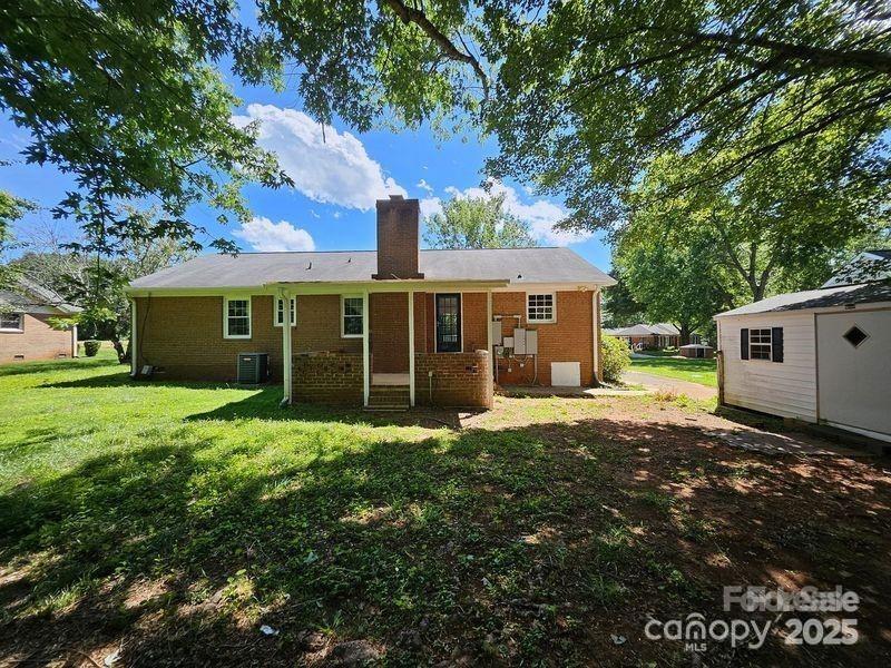 1109 Reid Harkey Road Matthews, NC 28105 - Photo 2 of 13 a view of a house with a yard