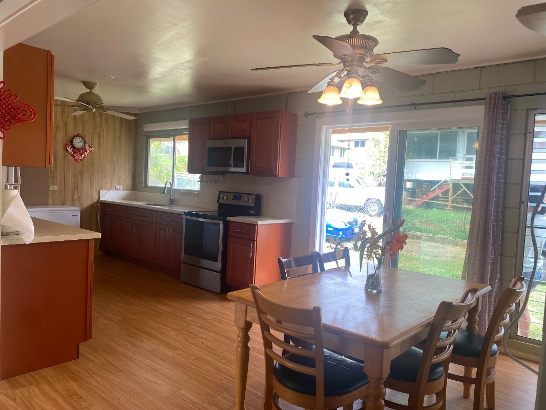 4793 Nonou Road Kapaa, HI 96746 - Photo 3 of 12 a view of a dining room with furniture window and outside view
