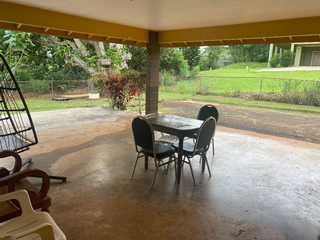 4793 Nonou Road Kapaa, HI 96746 - Photo 5 of 12 a dining room with yard and outdoor seating