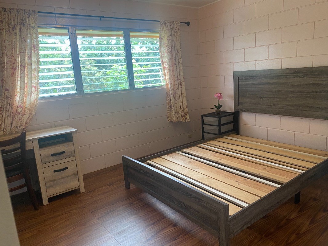 4793 Nonou Road Kapaa, HI 96746 - Photo 6 of 12 a bedroom with a bed and a dresser