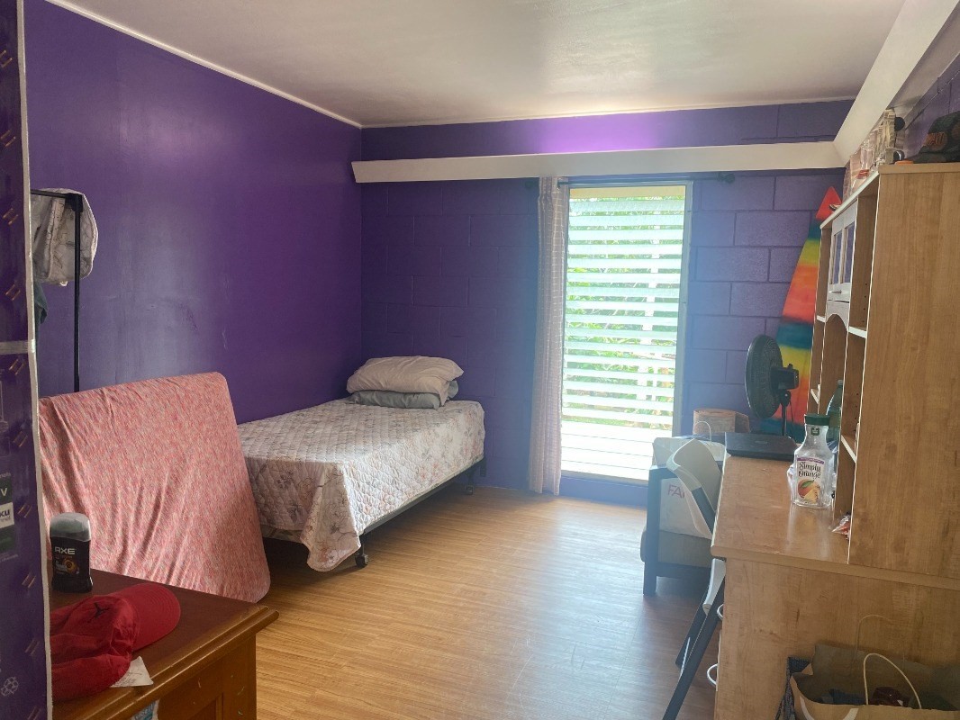 4793 Nonou Road Kapaa, HI 96746 - Photo 7 of 12 a bedroom with furniture and a window