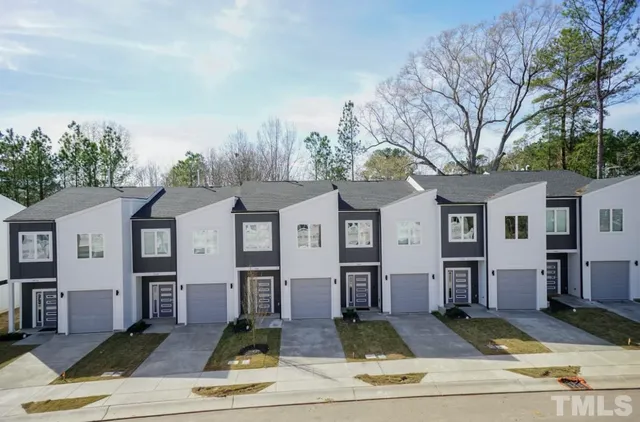 a building with trees in front of it