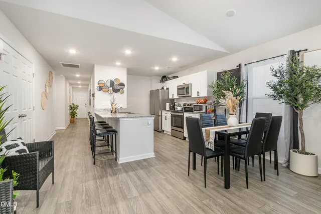 a view of a dining room with furniture
