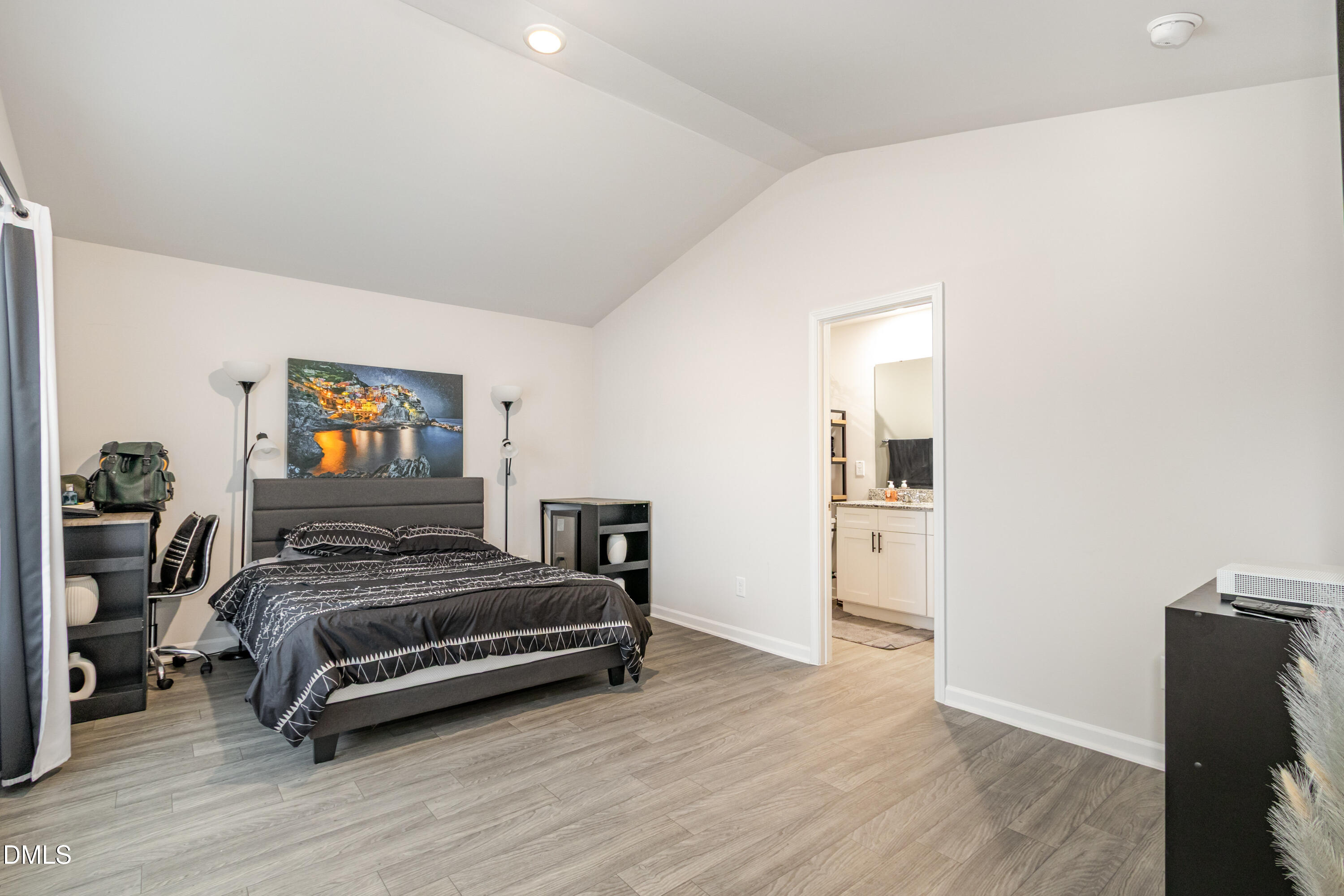 196 Keith Place Roxboro, NC 27573 - Photo 16 of 28 a bedroom with a bed and a tv on table