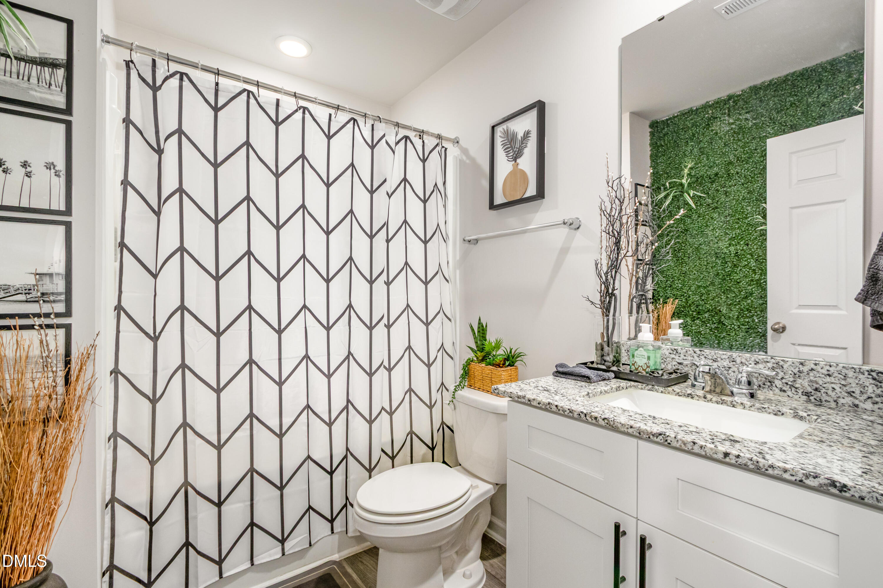 196 Keith Place Roxboro, NC 27573 - Photo 24 of 28 a bathroom with a granite countertop toilet and a sink