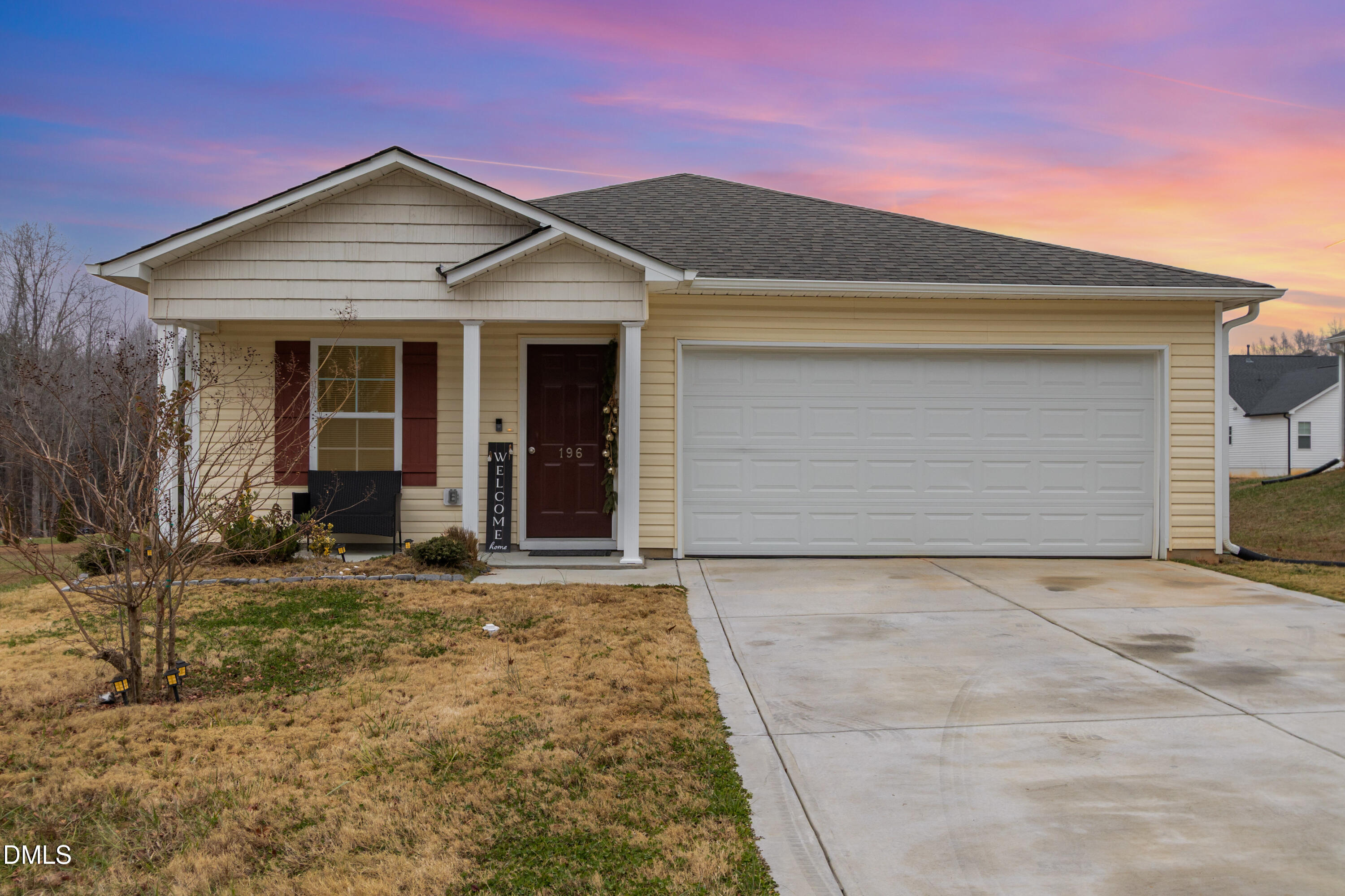 196 Keith Place Roxboro, NC 27573 - Photo 2 of 28 a front view of a house with a yard