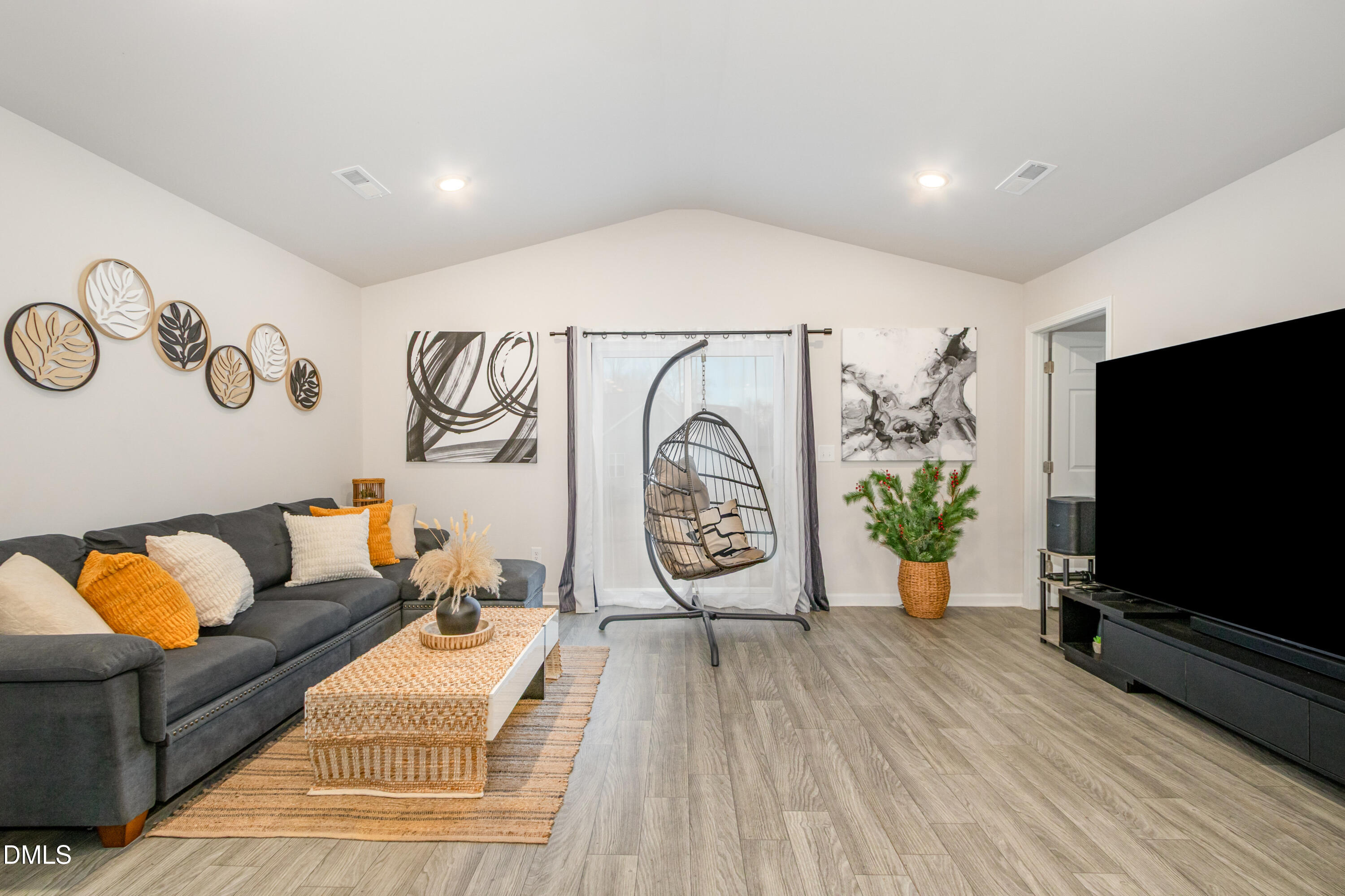 196 Keith Place Roxboro, NC 27573 - Photo 6 of 28 a living room with furniture and a flat screen tv