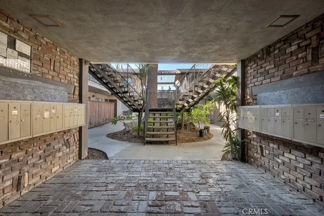 a view of a house with pool yard and furniture