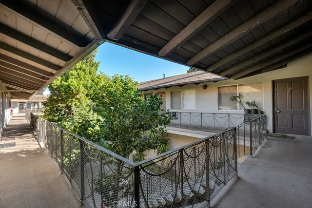 a front view of a house with a swimming pool