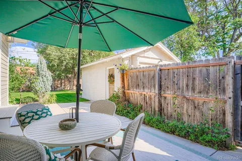 a view of an outdoor sitting area with furniture