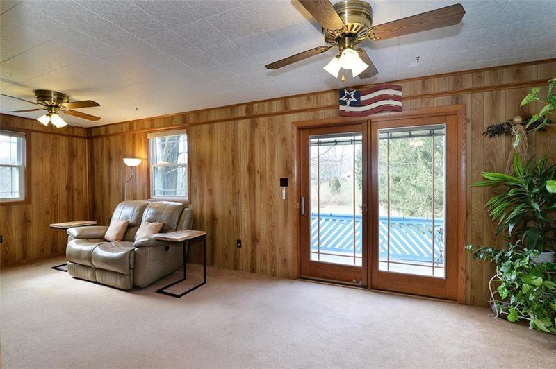 2595 Cole Road Wexford, PA 15090 - Photo 16 of 25 Four seasons room with outdoor deck access. Pella doors with built-in shades.
