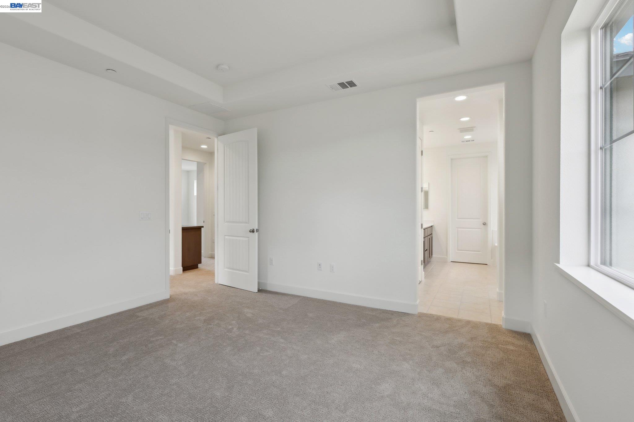 230 Mindy Way Pittsburg, CA 94565 - Photo 20 of 33 an empty room with windows and entrance to other room