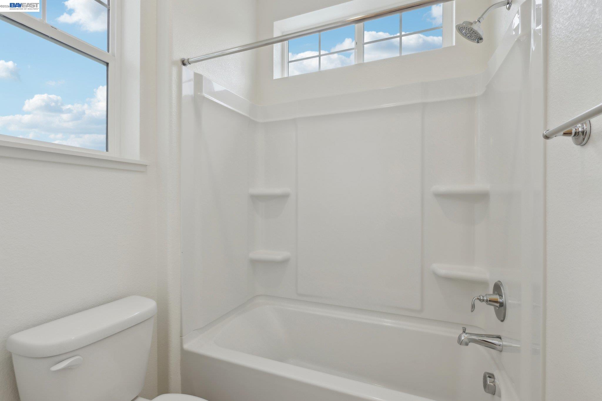 230 Mindy Way Pittsburg, CA 94565 - Photo 26 of 33 a bathroom with a bathtub and a toilet