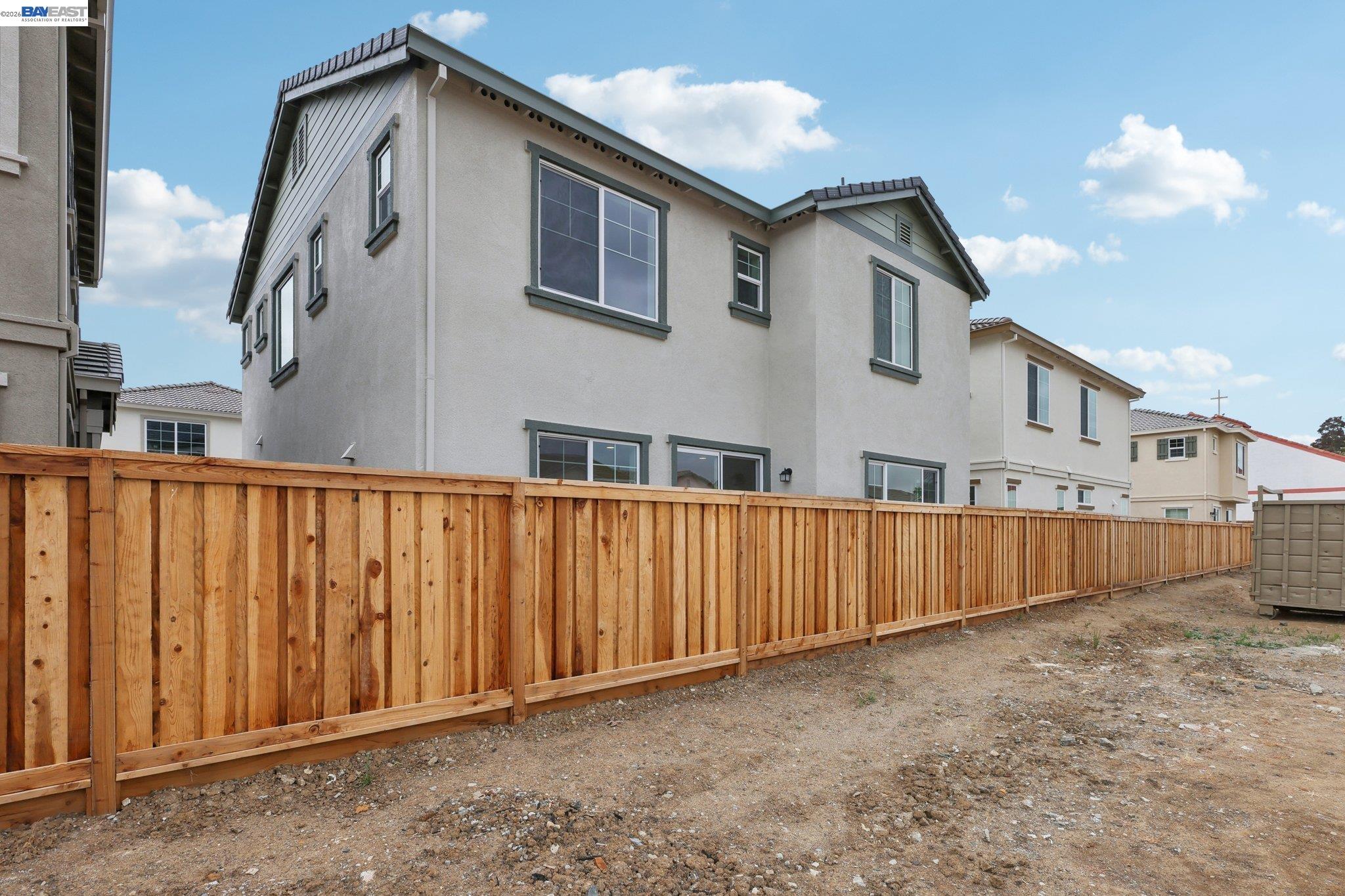 230 Mindy Way Pittsburg, CA 94565 - Photo 32 of 33 a view of a house with a wooden fence