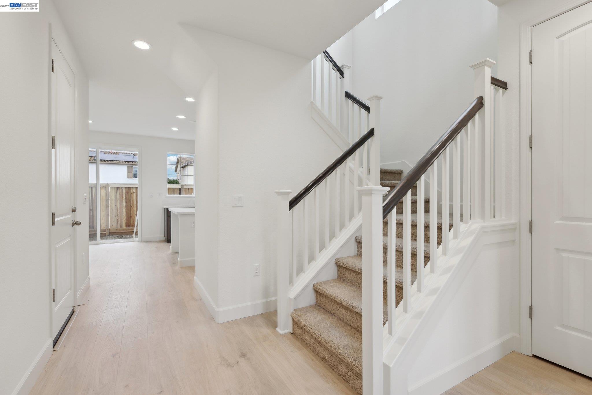 230 Mindy Way Pittsburg, CA 94565 - Photo 6 of 33 a view of a hallway with wooden floor and entryway