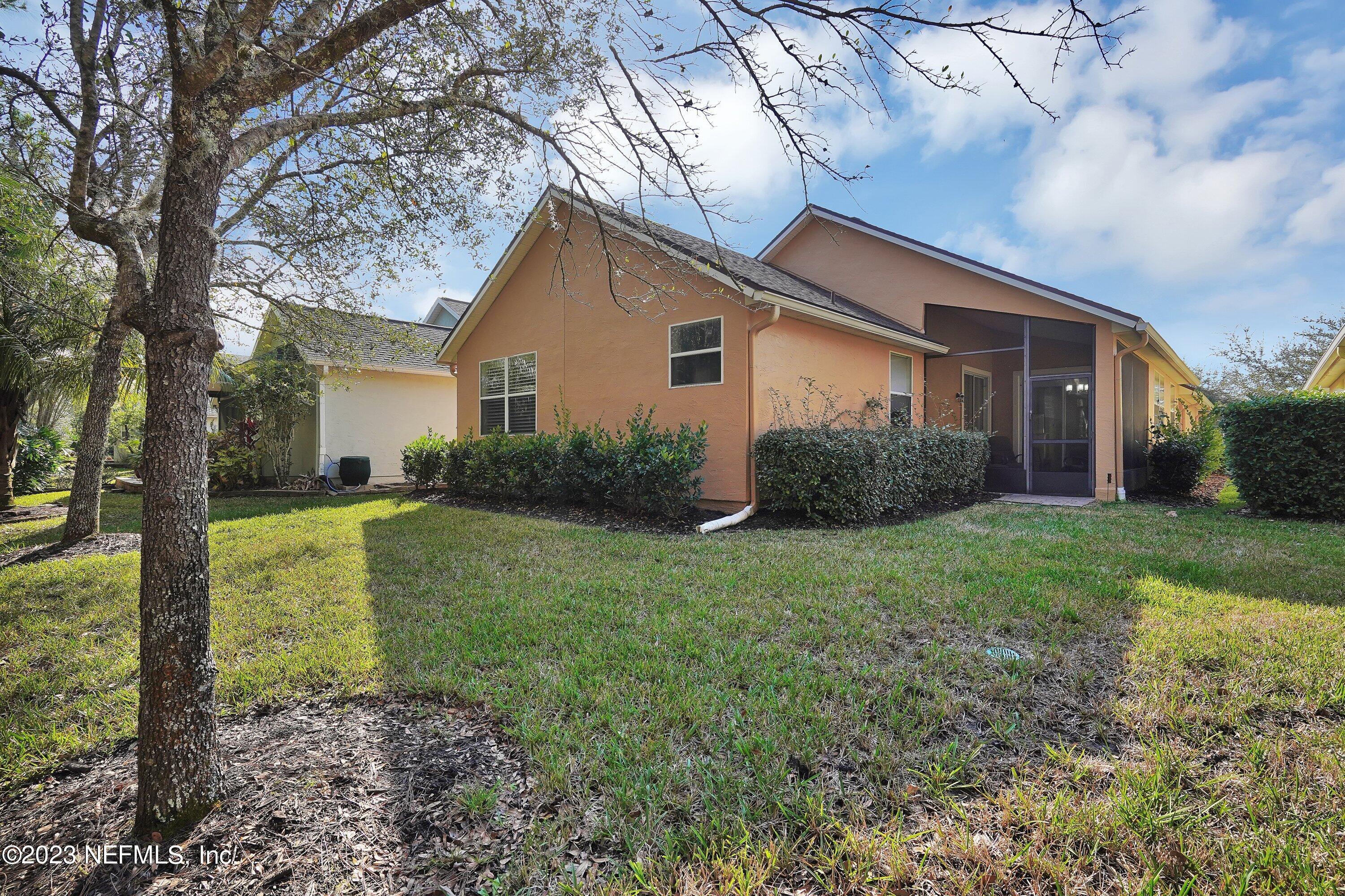 746 Copperhead Circle St. Augustine, FL 32092 - Photo 24 of 40 a view of a house with yard and tree s