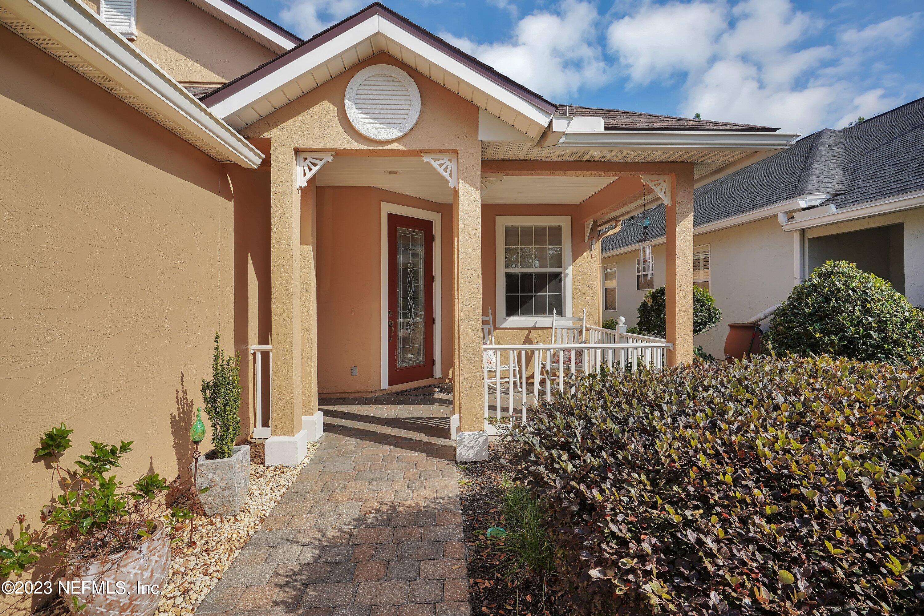 746 Copperhead Circle St. Augustine, FL 32092 - Photo 3 of 40 a view of a house with a small porch