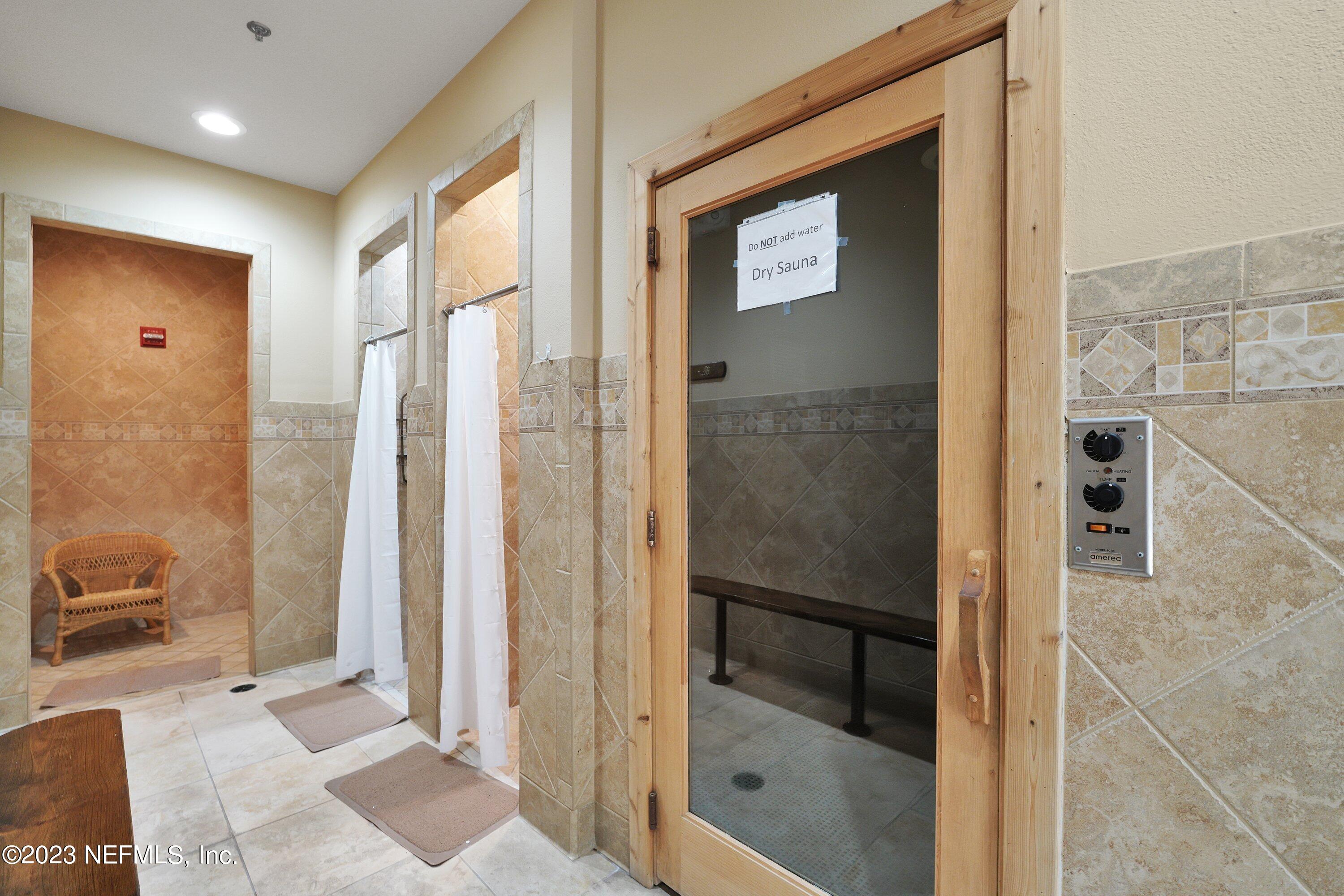 746 Copperhead Circle St. Augustine, FL 32092 - Photo 35 of 40 a bathroom with a shower and a sink