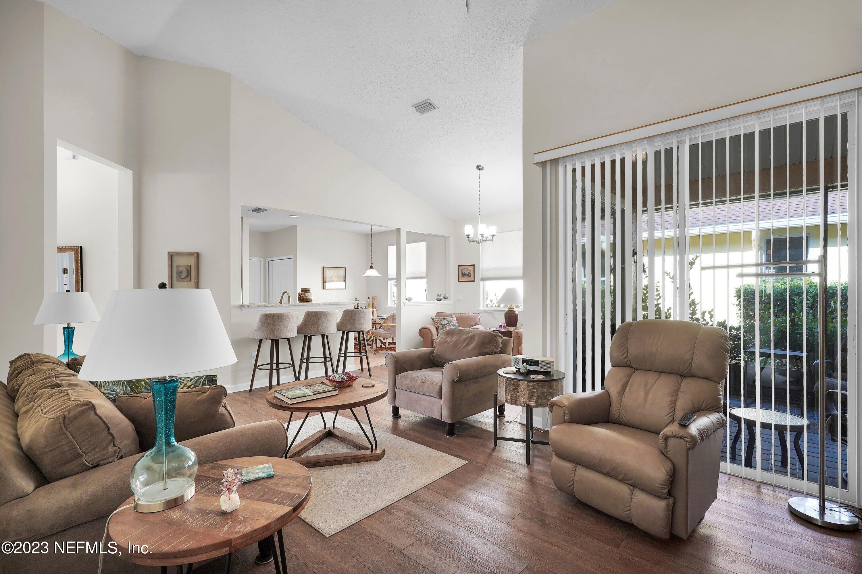 746 Copperhead Circle St. Augustine, FL 32092 - Photo 8 of 40 a living room with furniture and a large window