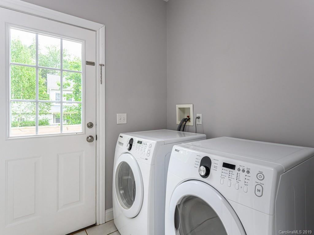 122 Round Top Road Asheville, NC 28803 - Photo 15 of 32 a utility room with dryer and washer