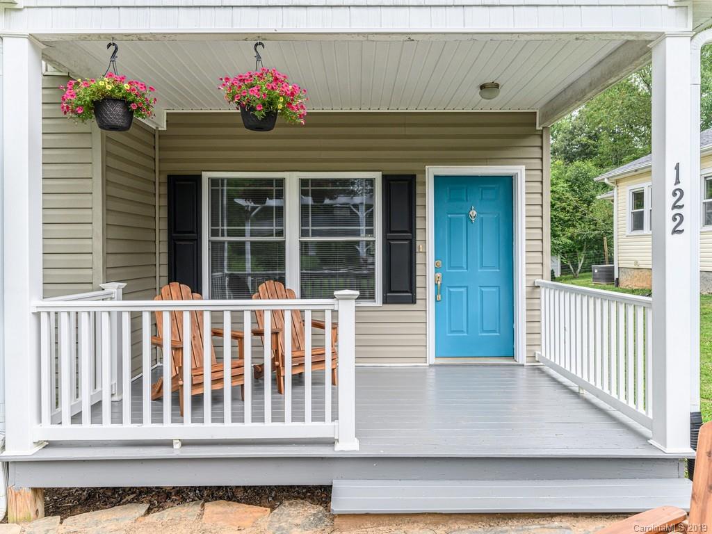 122 Round Top Road Asheville, NC 28803 - Photo 6 of 32 a front view of a house with a porch