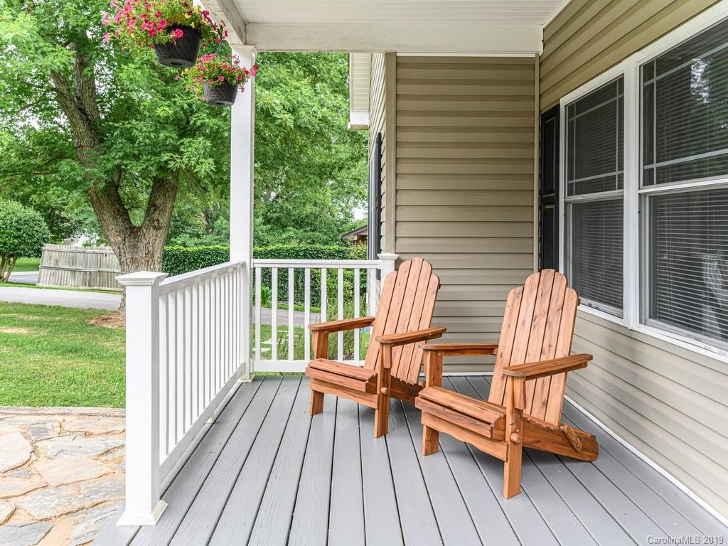 122 Round Top Road Asheville, NC 28803 - Photo 7 of 32 a view of a two chairs in the deck
