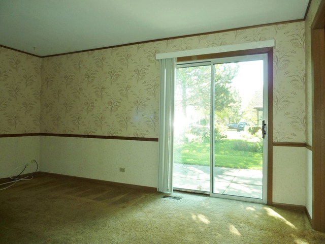 1820 77th Street Naperville, IL 60565 - Photo 11 of 18 a view of a room with a large window