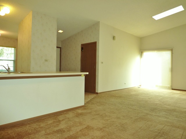 1820 77th Street Naperville, IL 60565 - Photo 3 of 18 a view of an empty room