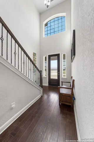 a view of livingroom with hardwood and furniture