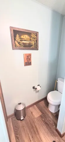 a bathroom with a toilet and a sink