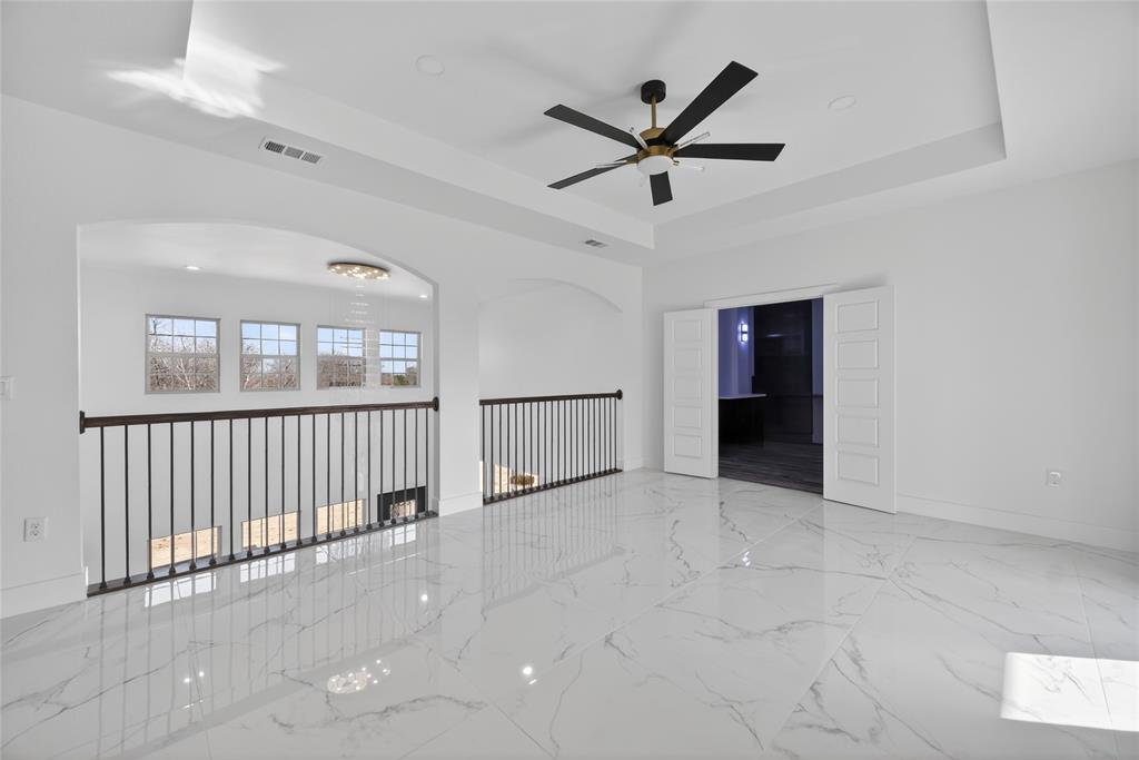 1530 South Houston School Road Lancaster, TX 75146 - Photo 24 of 37 an empty room with fan and windows