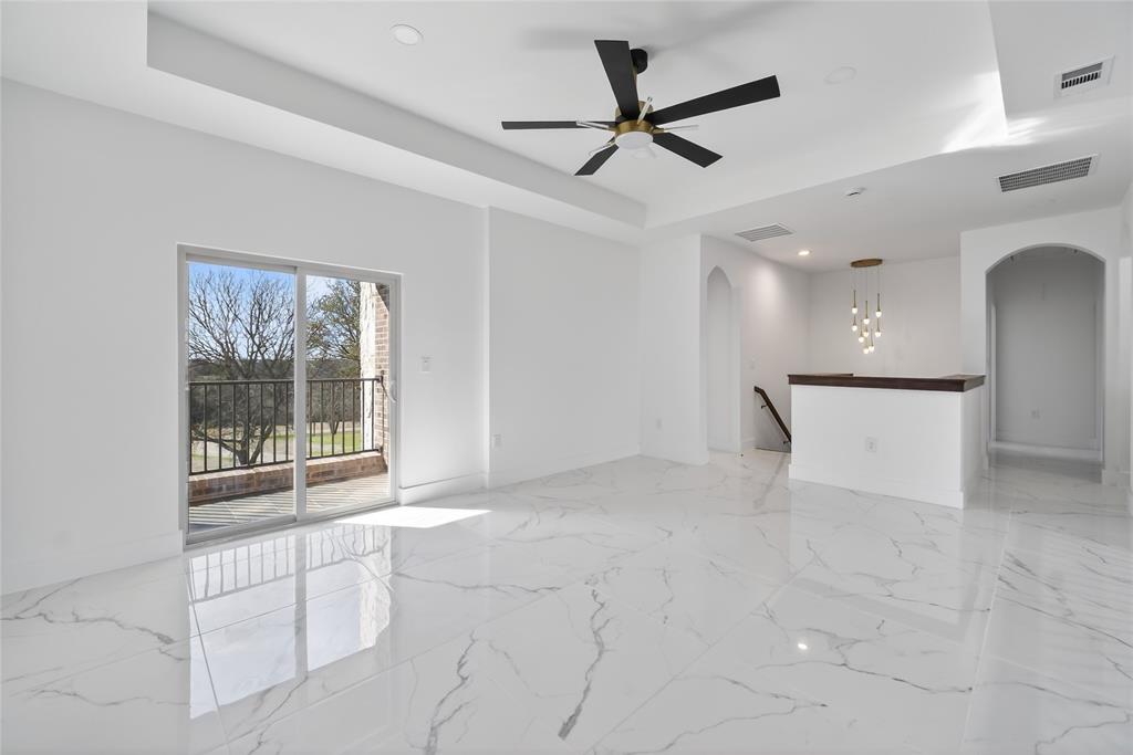 1530 South Houston School Road Lancaster, TX 75146 - Photo 26 of 37 a view of a livingroom with a ceiling fan and window