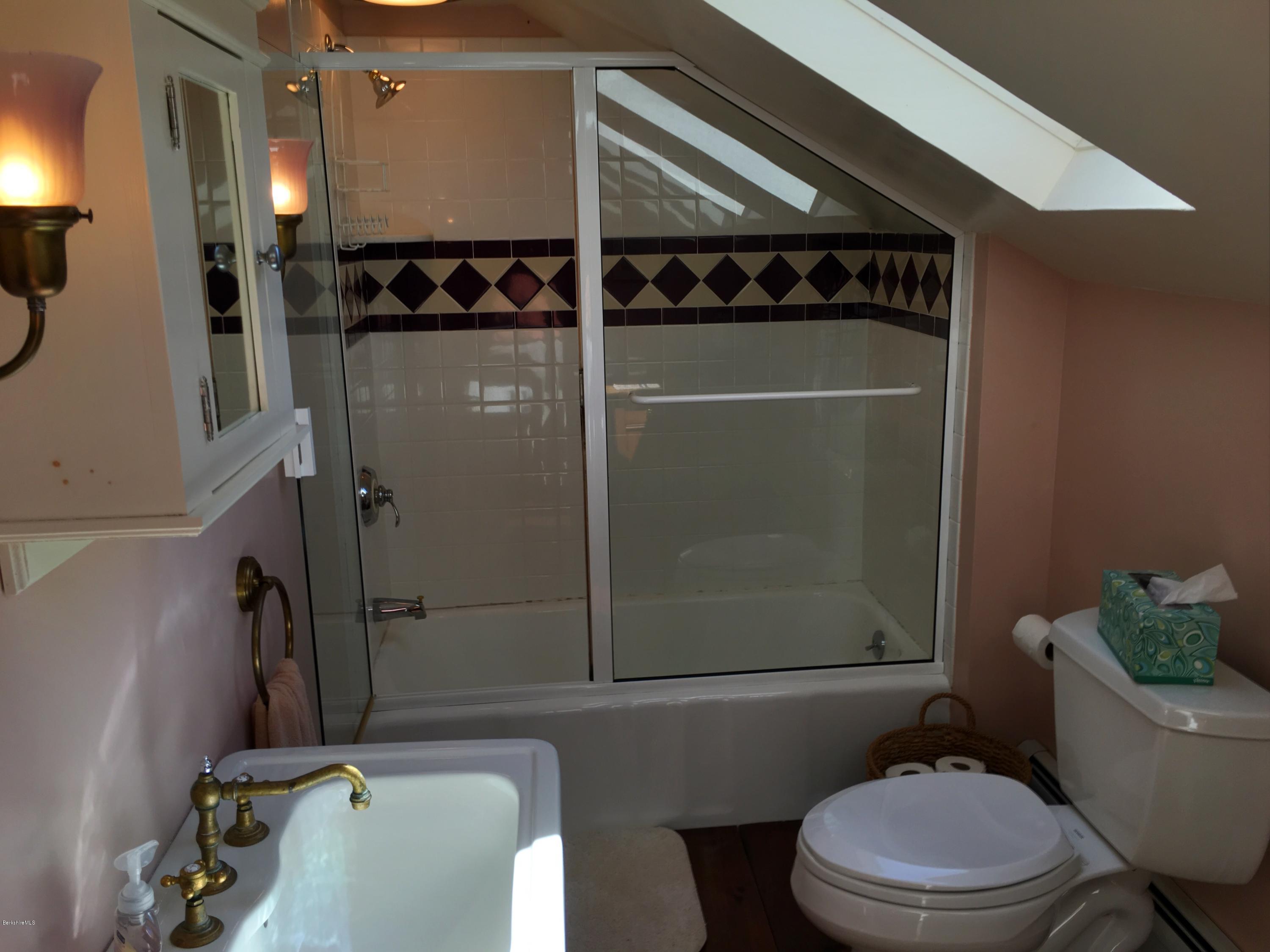 49 Sandisfield Road Sandisfield, MA 01255 - Photo 23 of 23 a bathroom with a toilet and a shower