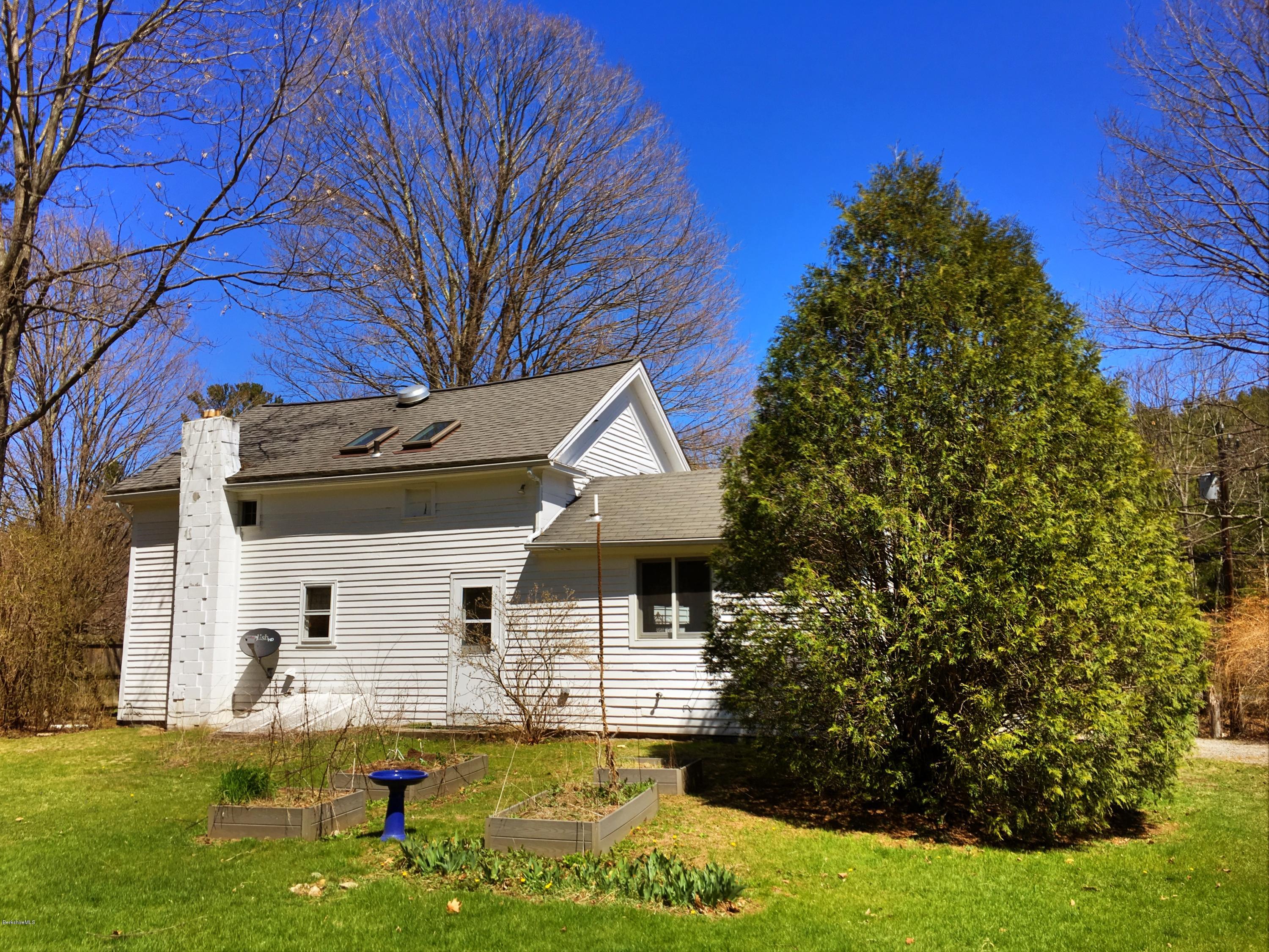 49 Sandisfield Road Sandisfield, MA 01255 - Photo 4 of 23 a front view of house with yard