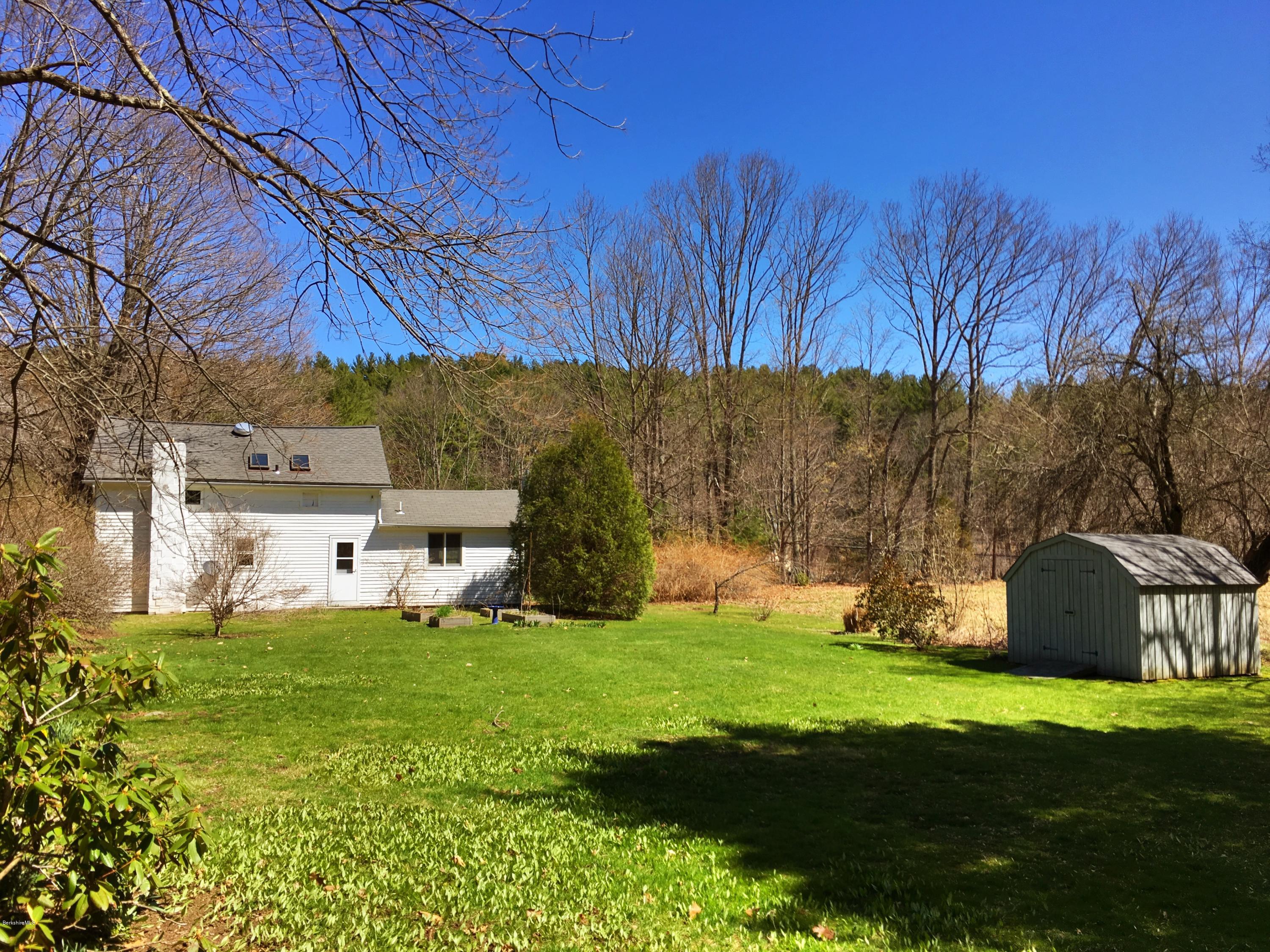 49 Sandisfield Road Sandisfield, MA 01255 - Photo 5 of 23 a view of a house with a yard