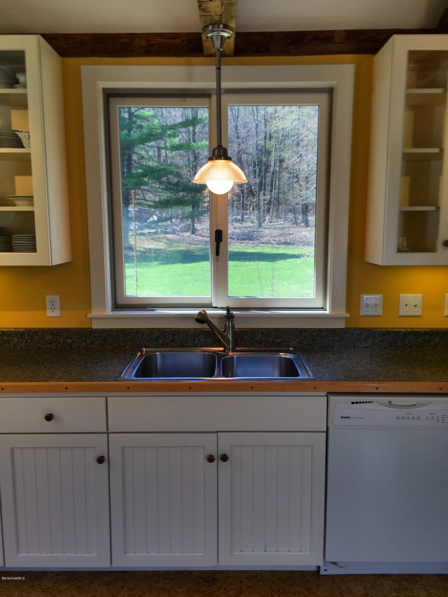 49 Sandisfield Road Sandisfield, MA 01255 - Photo 10 of 23 a kitchen with a sink and a window